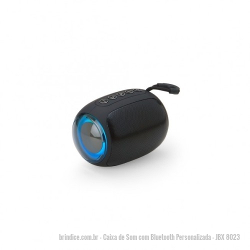 Caixa de Som com Bluetooth personalizada - Caixa de Som com Bluetooth Personalizada - JBX 8023 - Caixa de som Bluetooth com conectividade TWS, que permite sincronizar duas caixas de som em uma, aumentando a potência sonora. Possui iluminação RGB que se ajusta conforme a batida da música, entrada para cartão TF (MicroSD), pendrive, DC 5V e entrada auxiliar P2. A base é de silicone antiderrapante. Acompanha cordão de nylon e cabo USB-V8. - 172875 - Portal de Brindes Personalizados | Guia Bríndice 38 Anos - Caixa de Som com Bluetooth