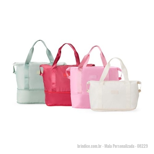 Mala personalizada - Mala Personalizada - 08229 - Bolsa esportiva para carregar equipamentos, calçados e roupas. Feita em poliéster resistente à água, possui um compartimento expansível que aumenta a capacidade máxima da bolsa para até 26 litros. Além do amplo espaço interno com direito a bolso para organização de objetos menores, também apresenta bolso externo com área para o encaixe de alças de malas de viagem. - 175099 - Portal de Brindes Personalizados | Guia Bríndice 38 Anos - Mala