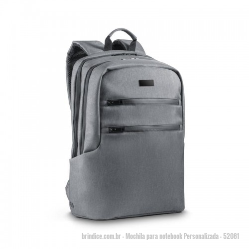 Mochila para notebook personalizada - Mochila para notebook Personalizada - 52081 - Mochila para notebook em Nylon 2Tone impermeável com 2 compartimentos e alças almofadadas. O compartimento posterior tem 2 divisórias almofadadas com fecho em velcro para notebook até 17'' e tablet até 10.5''. Compartimento frontal com diversos bolsos interiores. Contém dois bolsos na parte frontal, tendo um deles bloqueio RFID. Nas laterais existe um bolso para garrafas em elastano e outro para o guarda chuva, com ilhós perfurados para evitar acumulação de água. A parte detrás almofadada tem bolso oculto e banda para transporte em trolley. Placa metálica removível com imã, para fácil gravação. 320 x 450 x 140 mm - 155653 - Portal de Brindes Personalizados | Guia Bríndice 38 Anos - Mochila para notebook